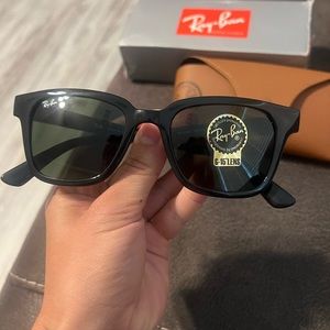 brand new in box with case, never worn black rayband sunglasses